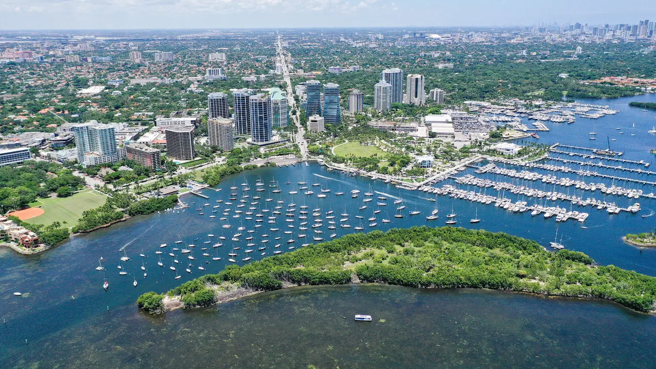 Coconut Grove's waterfront from above, with Dinner Key and its marina in front of the neighborhood where the arts festival is held.