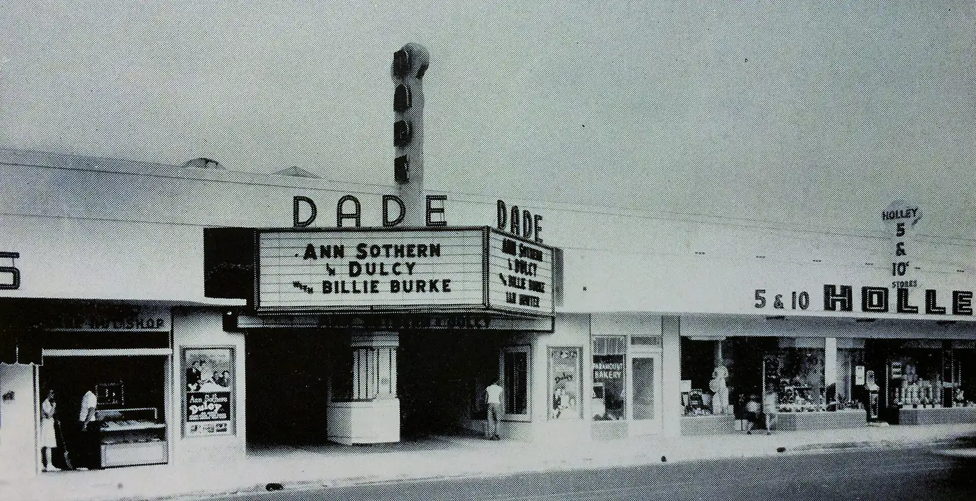 The Dade Theater and Holley Five and Dime storefronts in Allapattah in an old photograph