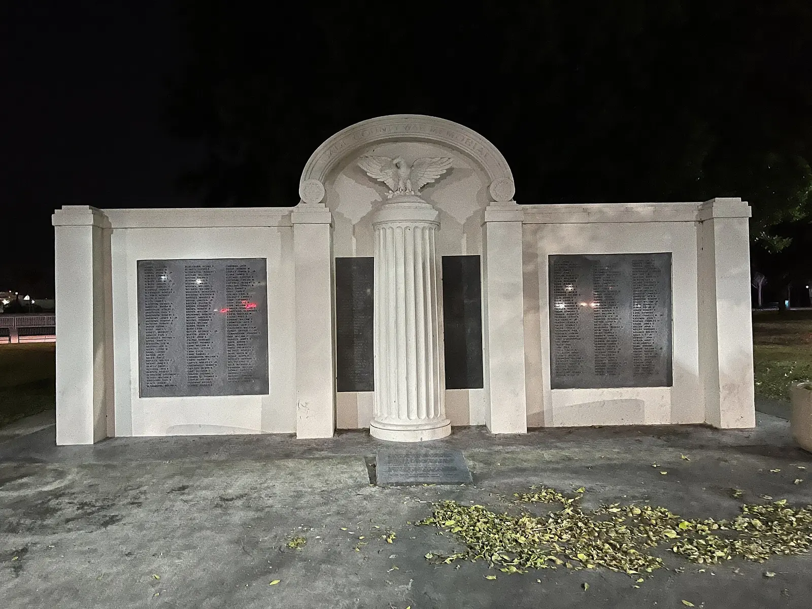 The Dade County War Memorial in Bayfront Park, downtown Miami, at night.