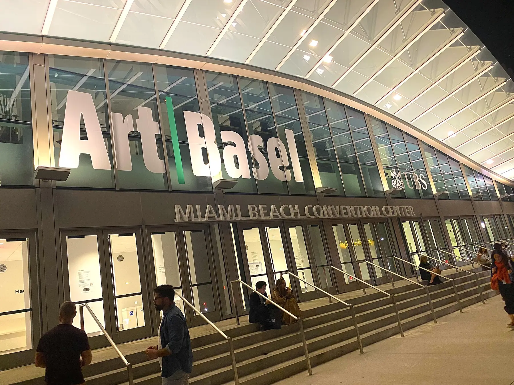 Visitors on the show floor at Art Basel Miami Beach in the Miami Beach Convention Center.