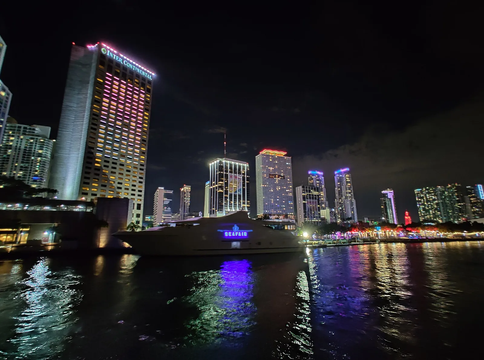 Bayfront Park at night, with the InterContinental hotel and the downtown Miami skyline behind it.