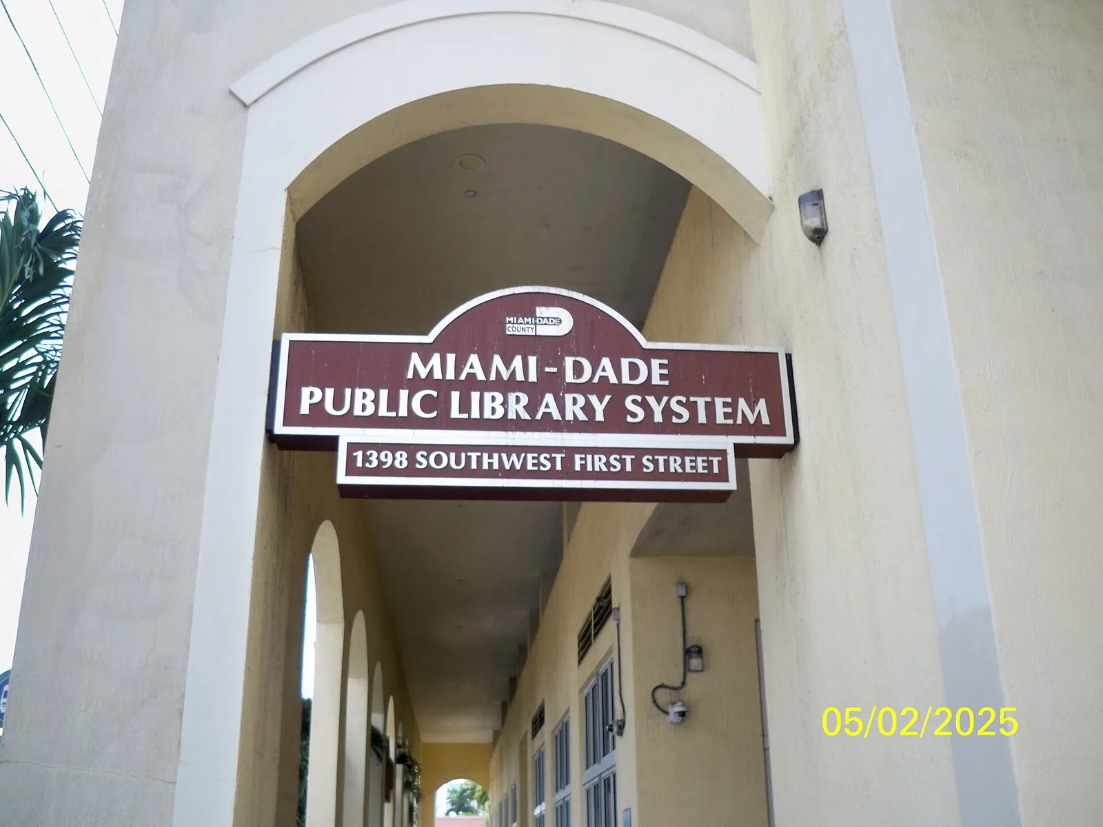 The entrance walkway of the Hispanic Branch Library on SW First Street, an early voting site in Miami.