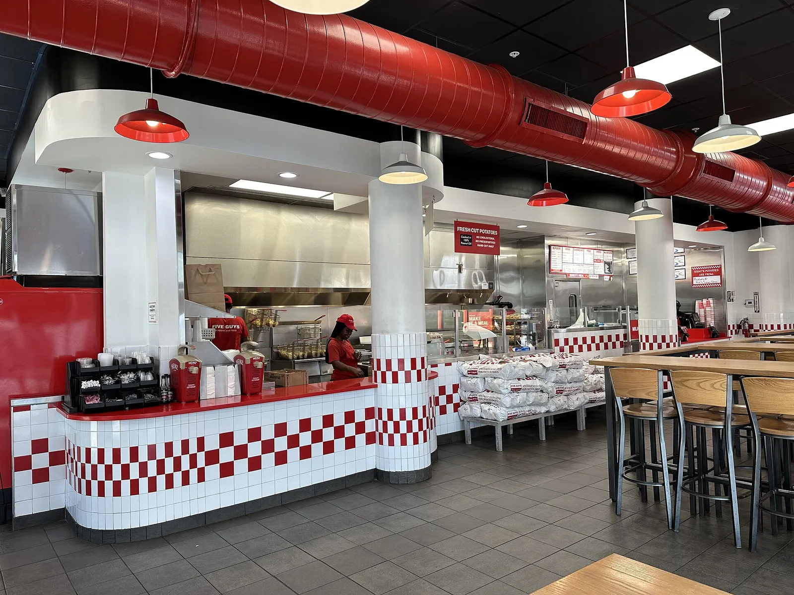 The counter at Five Guys in Bayside Marketplace in downtown Miami, one of the places on this list.
